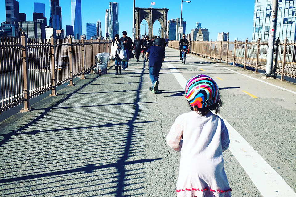 Watch the city wake up as you stroll across the Brooklyn Bridge. Photo  by Meagan Newhart 