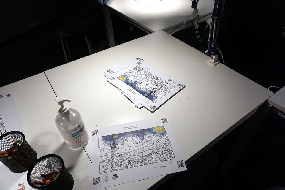 Table for coloring at Van Gogh: The Immersive Experience