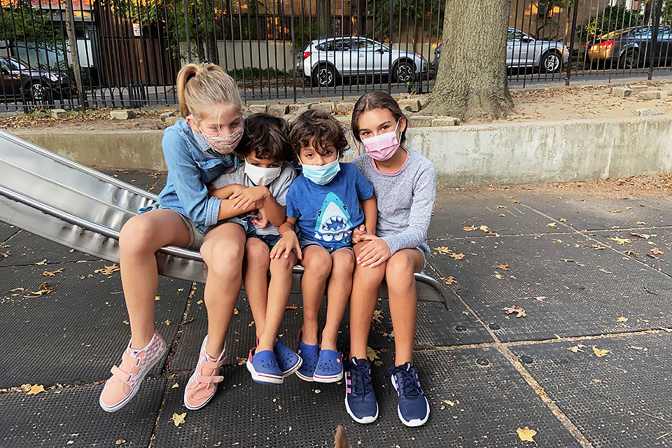 kids on the slide at Adam Yauch Park