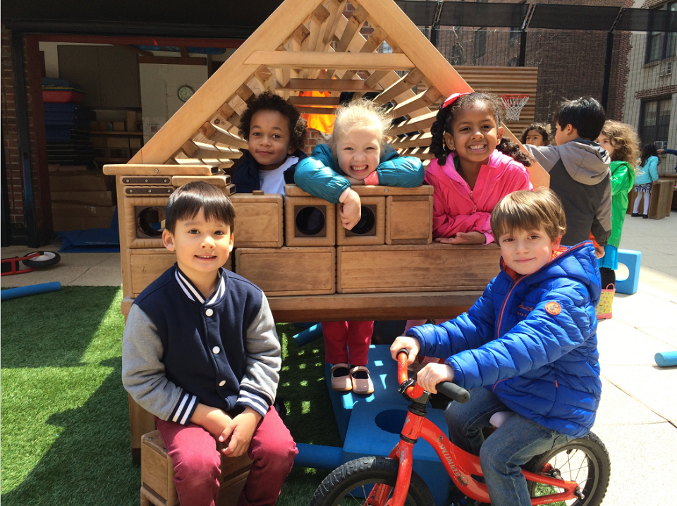 Preschoolers at All Souls get plenty of play time to romp on the rooftop playground. Photo courtesy of the school