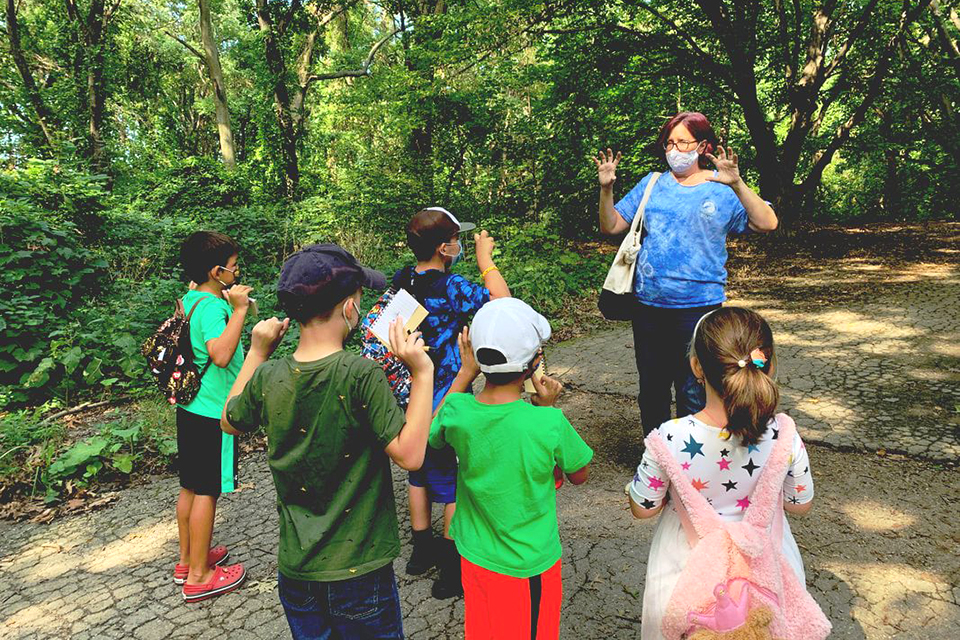 Instructor leads outdoor classes at the Alley Pond Environmental Center