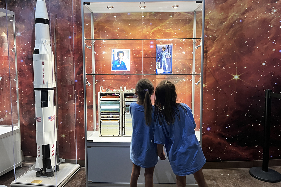 Kid-Friendly Science Museums in Atlanta: Mimms Museum of Technology and Art: Kids looking at space memorabilia