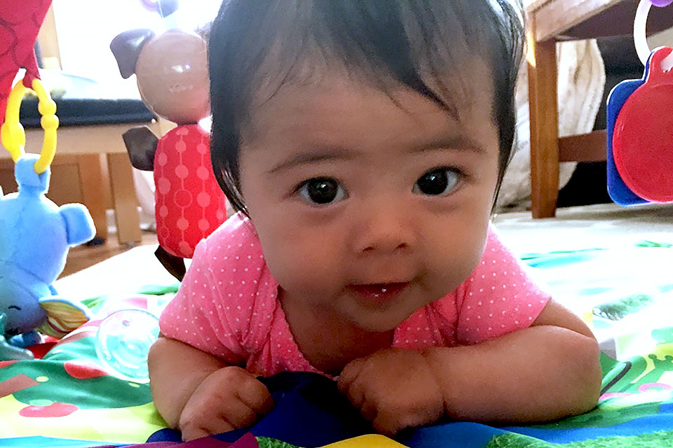 Baby smiling at camera - Top Unique Baby Names For Generation Alpha Babies