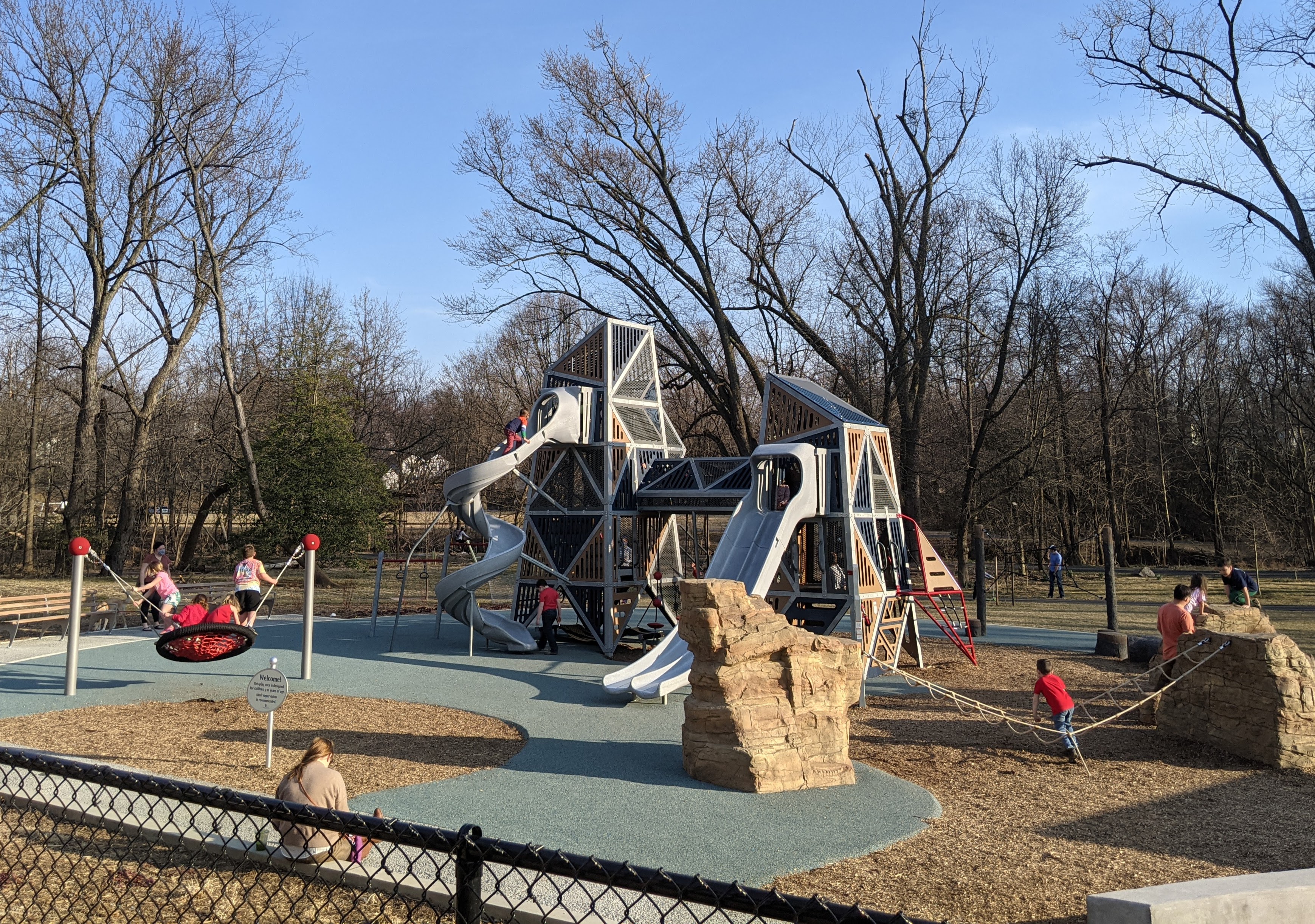 New playground equipment at Banneker Park in Arlington includes slides and a rock climbing obstacle course. Photo by the auth0r.