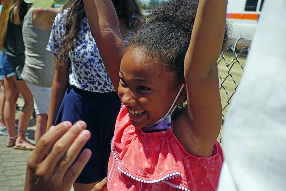 Belmont Park, NY: Girl celebrating a horse race