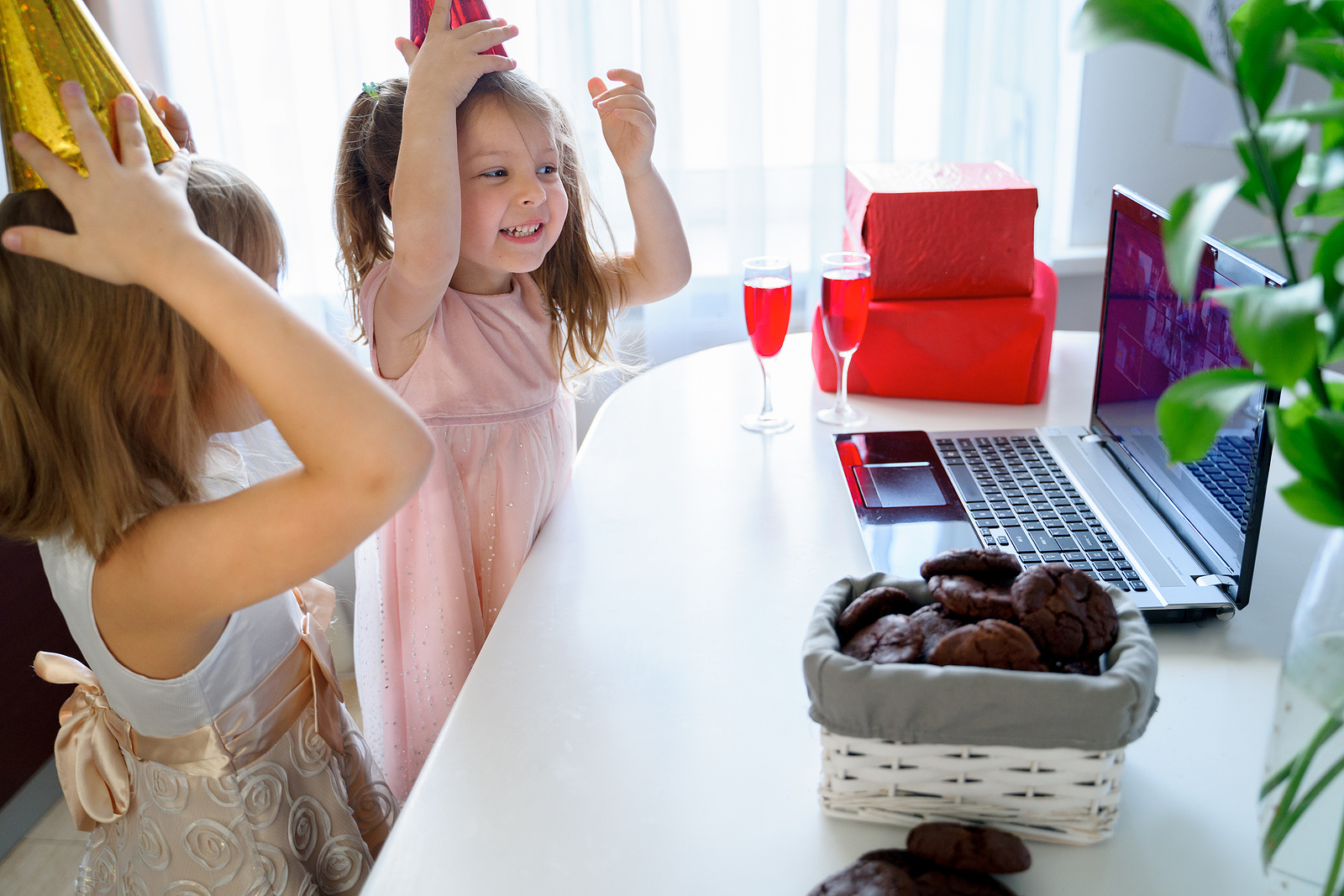 Party hats and pretty punch make virtual birthday celebrations special.