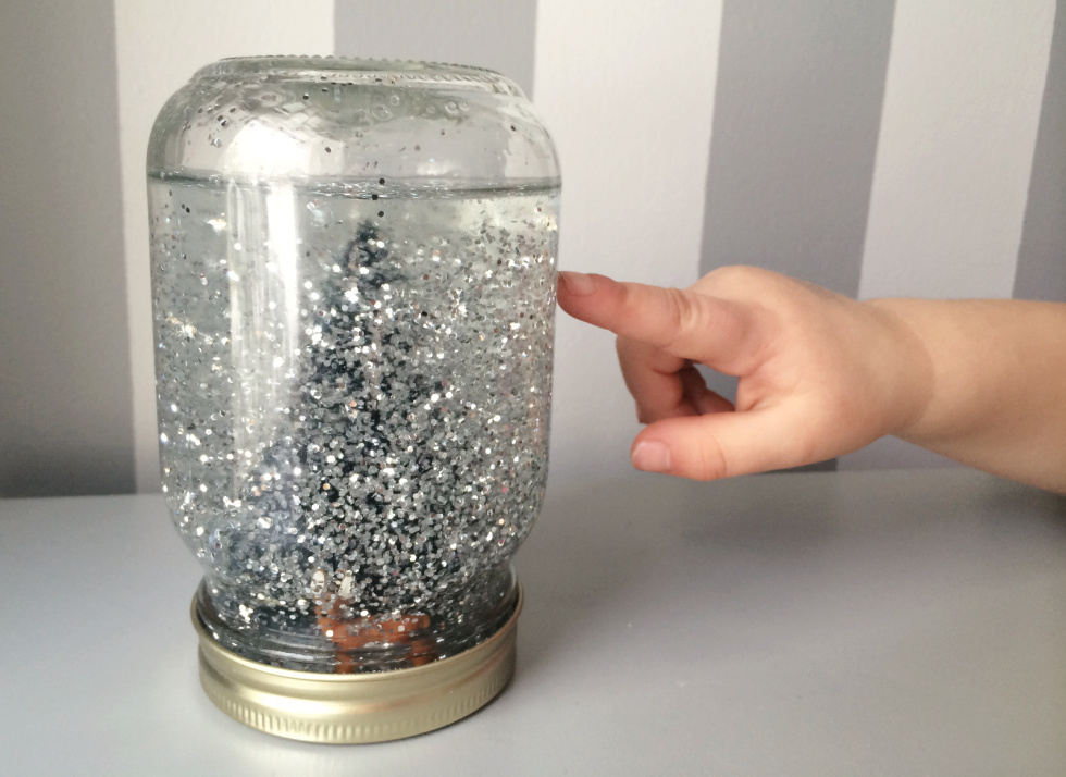 A little glitter creates a magical snow globe.