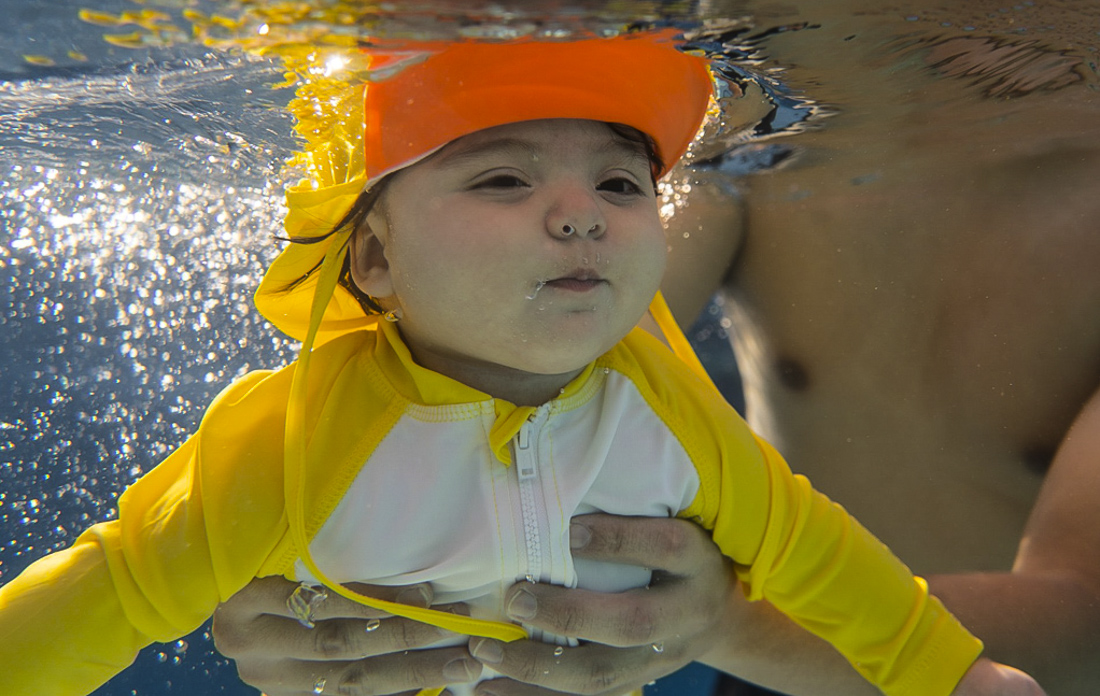 Baby swim classes get LA kids water safe, from a very young age. Photo courtesy of the Blue Buoy Family Swim School 