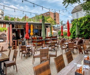 Play a game of Jenga or cornhole before dinner at The Bowery Bar. Photo courtesy of The Bowery Bar