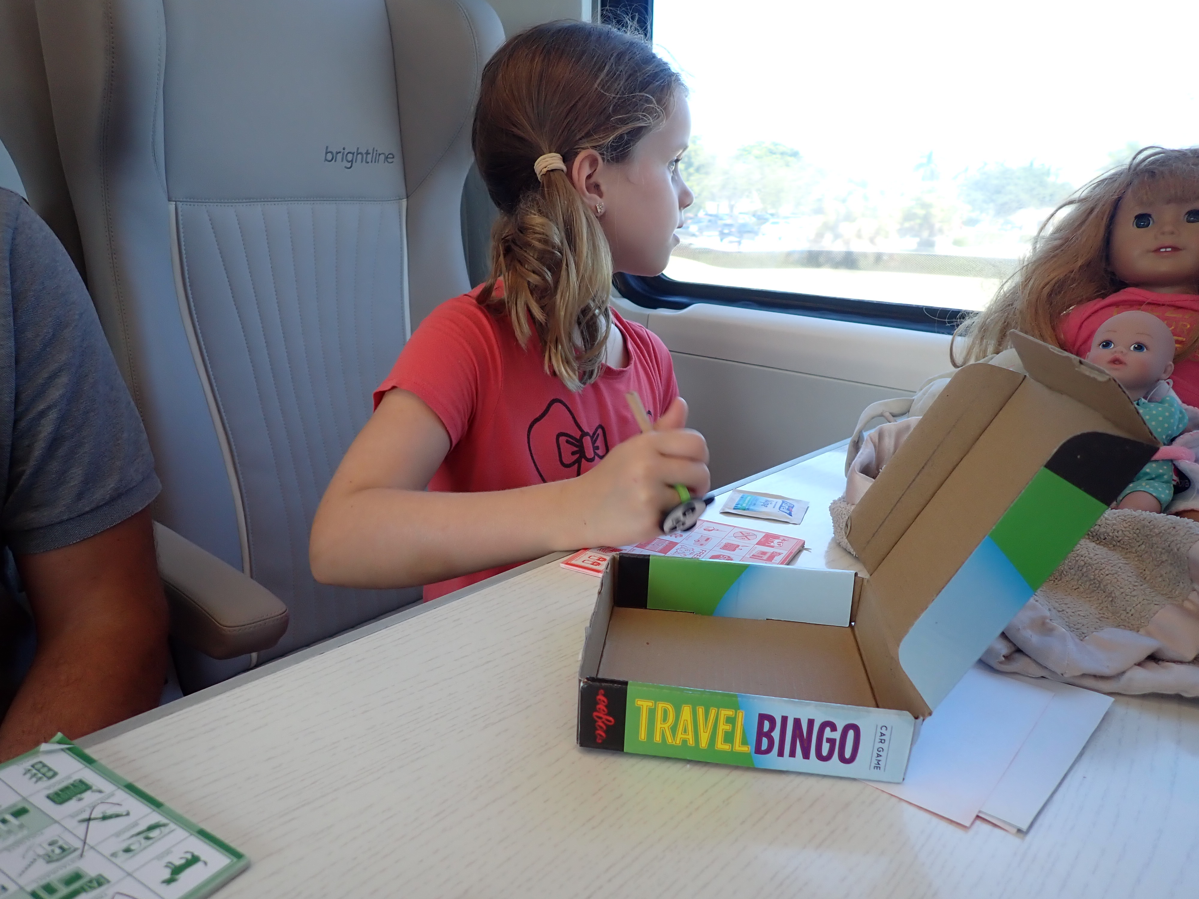 Kids on board the Brightline Train from West Palm Beach to Miami