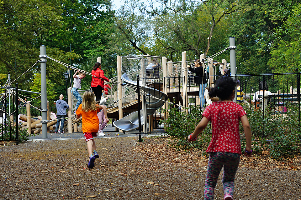 Children race toward Margaret L. Kempner Playground