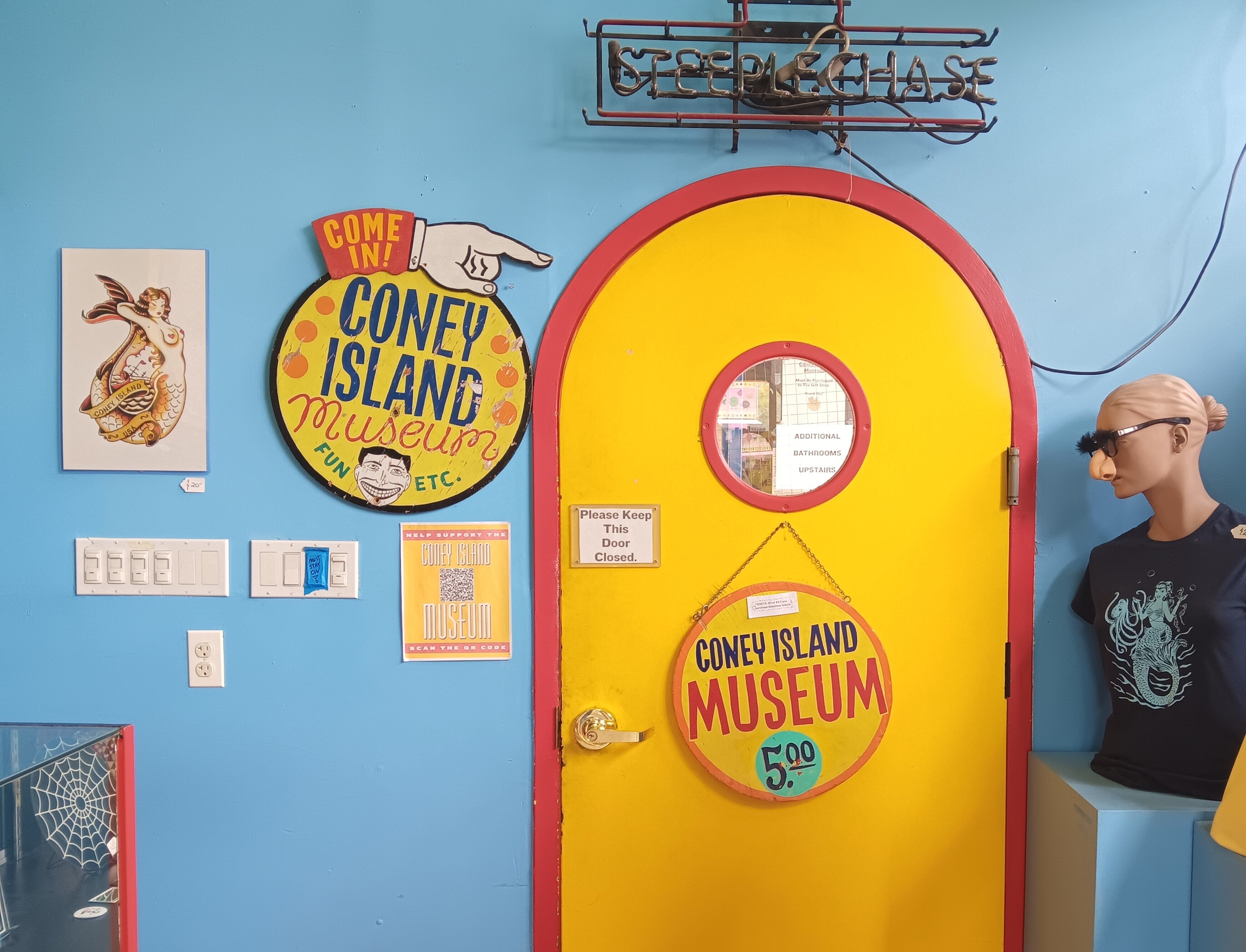 Head through the bright yellow door to see the treasures of the Coney Island Museum—as unique as the neighborhood it pays homage to!