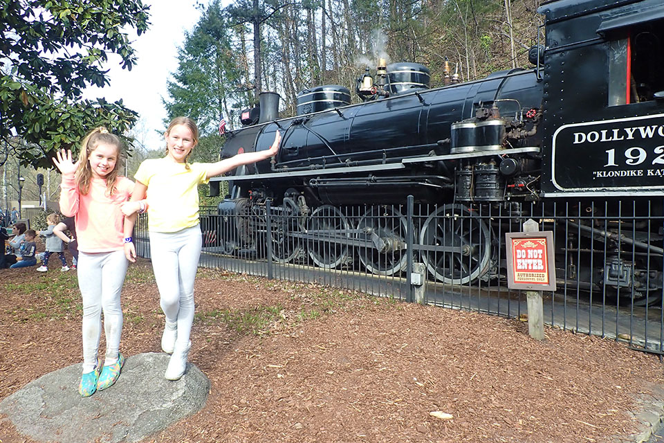 Ride the iconic Dollywood Express, a coal-fired steam train. 