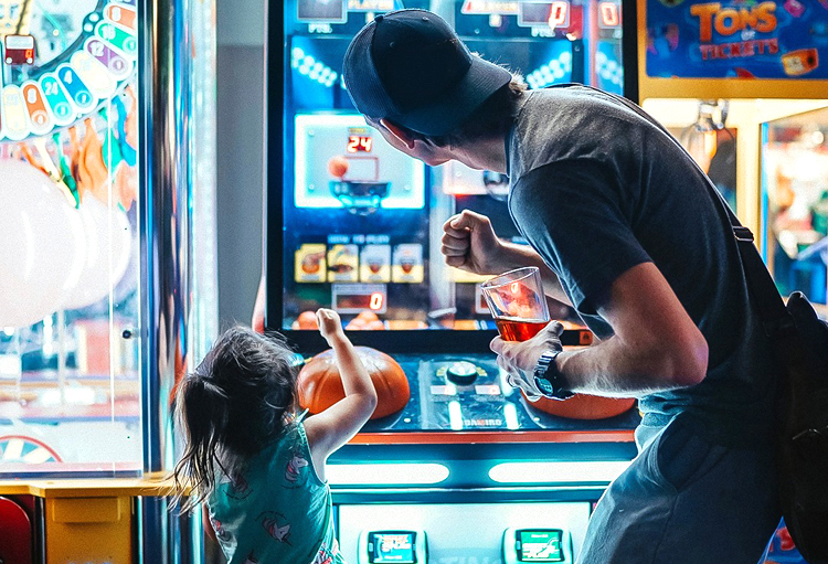 Go bowling or play arcade games while you wait for food at Lucky Strike.