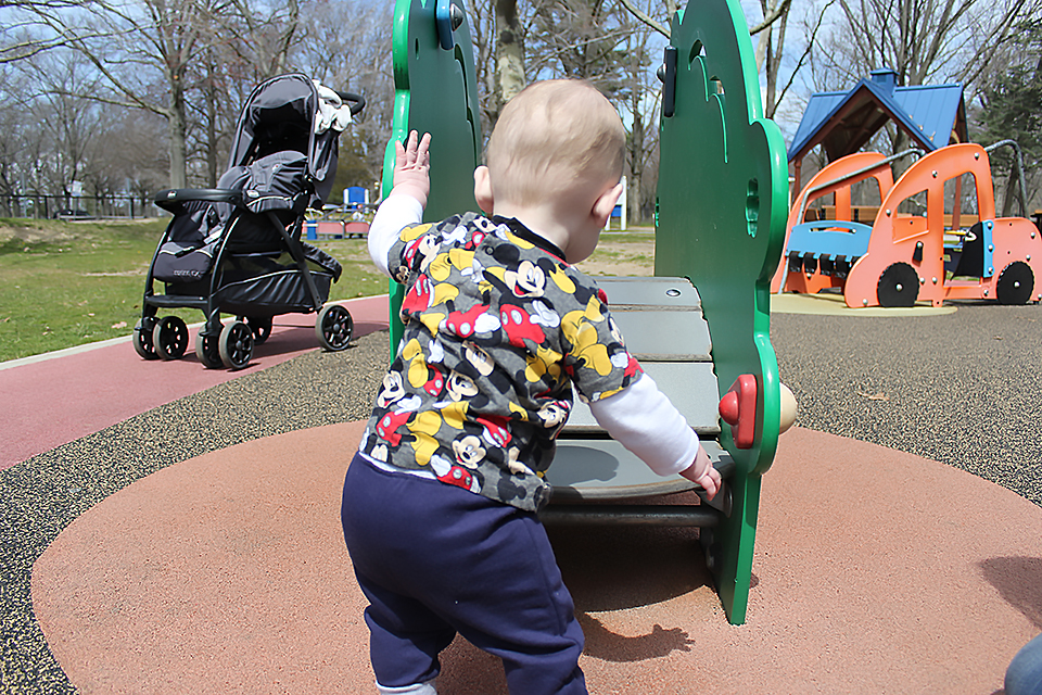 boy at playground at Eisenhower Park