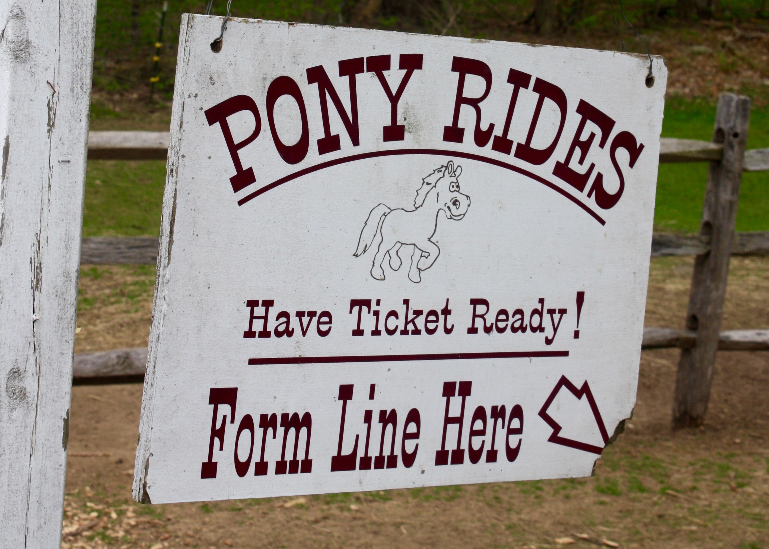 Photo of sign for Pony Rides at Flamig Farm in CT.