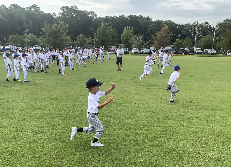 Get world-class instruction from coaches with years of professional baseball training. Photo courtesy of  Gatorball Academy 