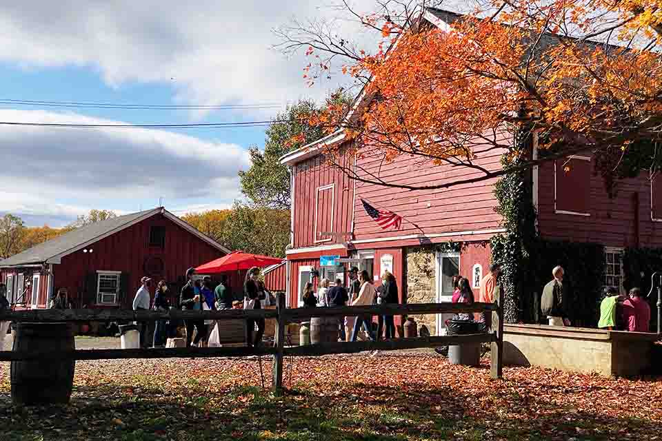 Guests gather at the Hacklebarney Farm Cider Mill