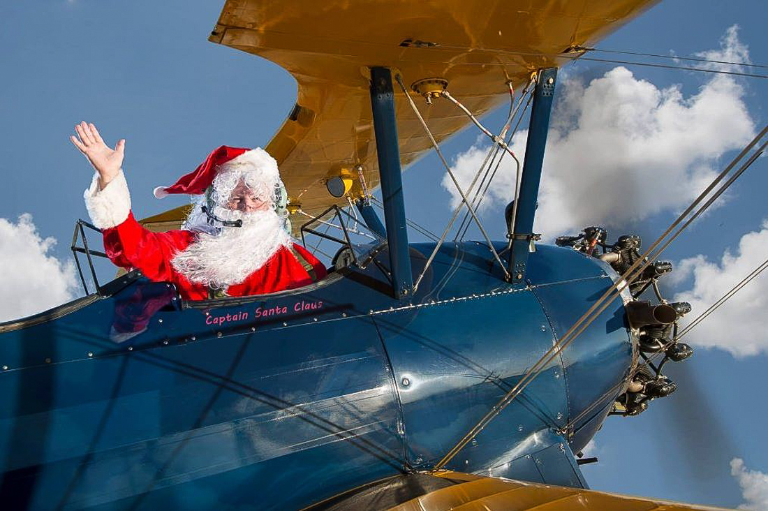 Watch Santa arrive by plane at Stearman Santa. Photo courtesy of Lone Star Flight Museum. 