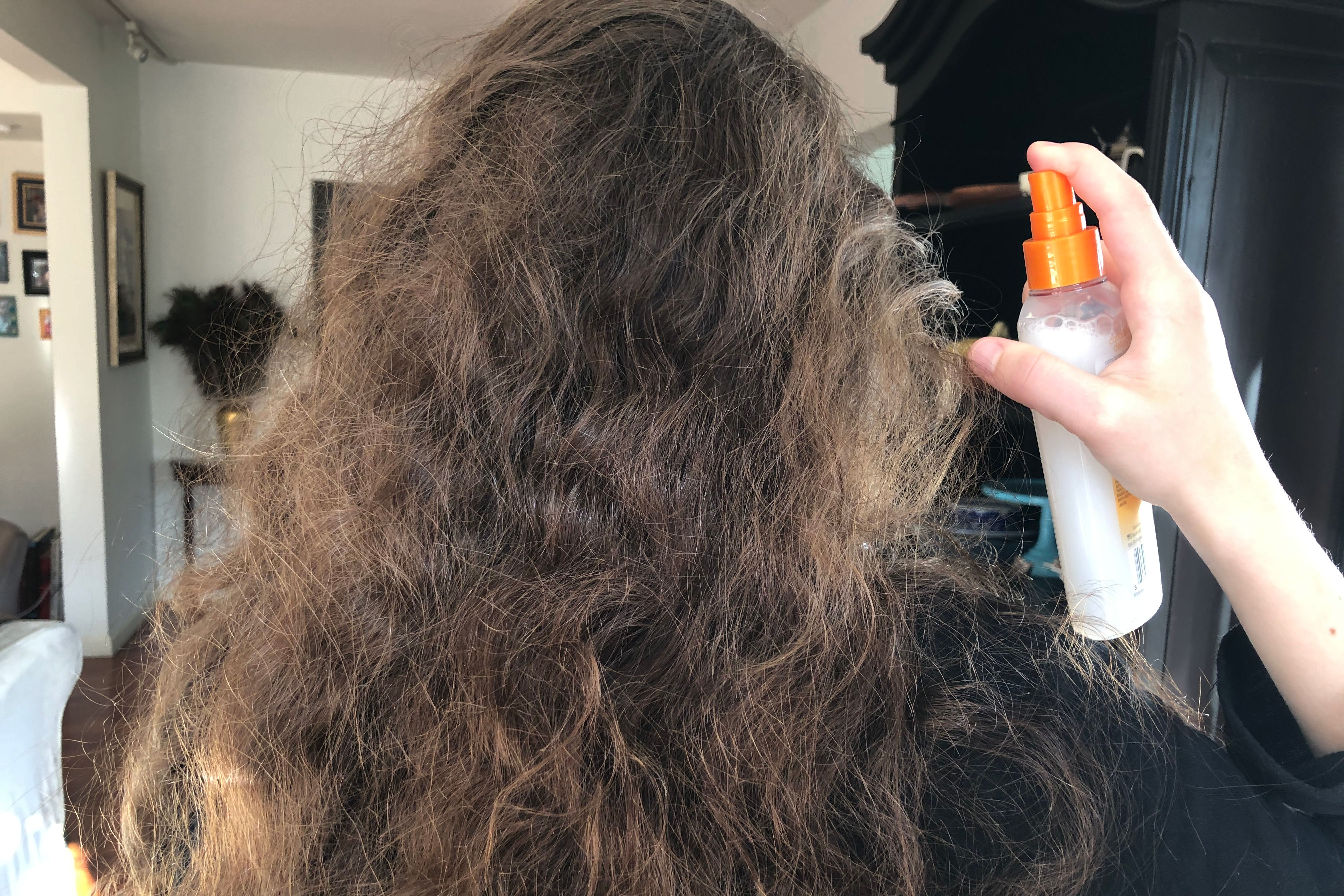 Leave-in conditioners make managing those epic knots so much easier. Photo by Meghan Rose