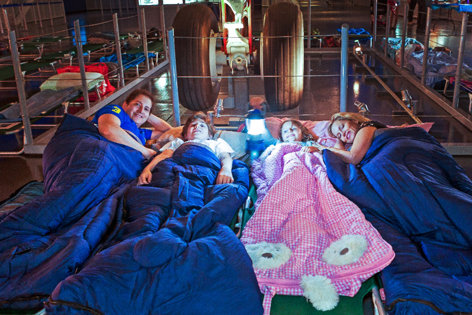 Sleep among the aircraft at Operation Slumber Intrepid Museum
