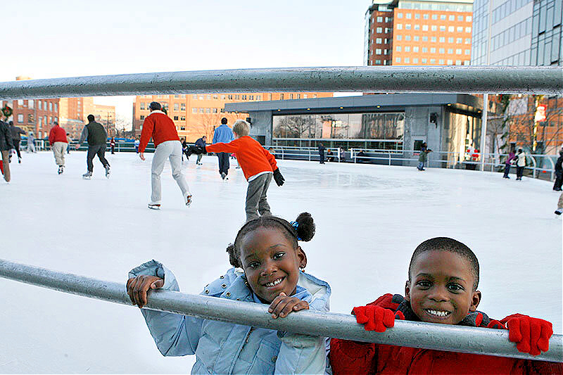 Photo of children at Kendall Square outdoor ice skating rink