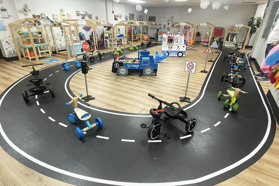 Kids can hop on tricycles and ride around the indoor track at L.I. Salty Kids Cove. 