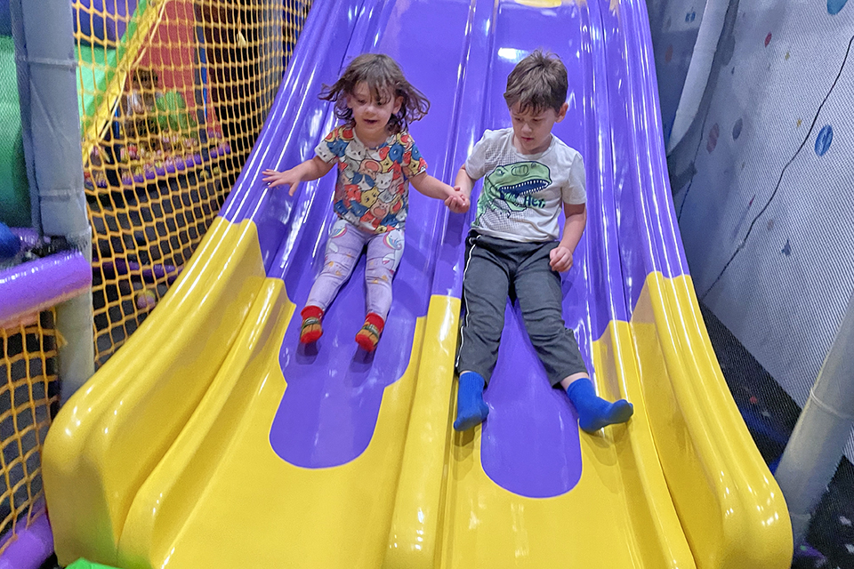 Speed down the slides at Bellmore's Planet Play. 