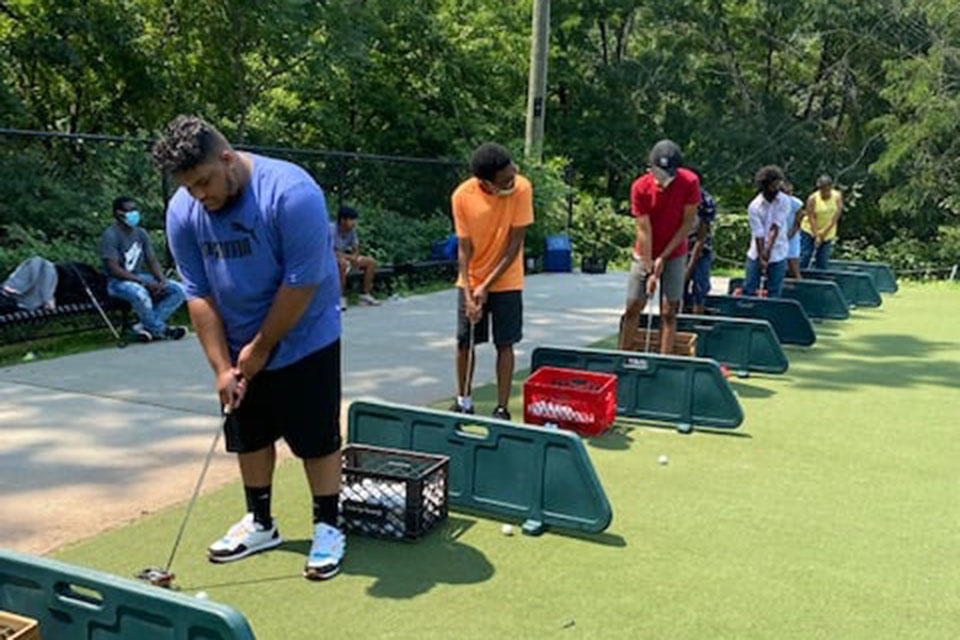 At the Boys & Girls Club camp, activities include golf. Photo courtesy of the camp