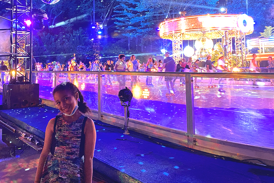 The DiscOasis girl poses outside the rink