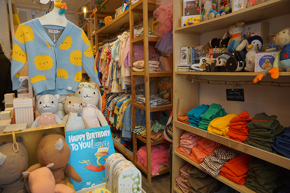 Little Moony sells handmade clothes and a curated collection of toys and books in the heart of Little Italy. Photo by Jody Mercier 