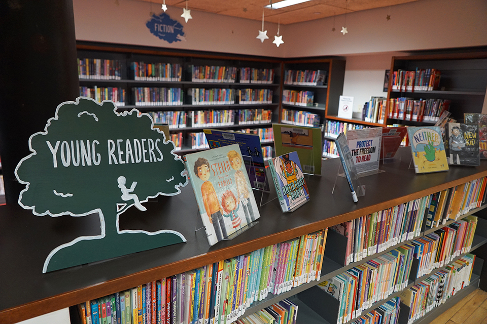 Things To Do in Little Italy with Kids: the children's section of books at Mulberry Street Library