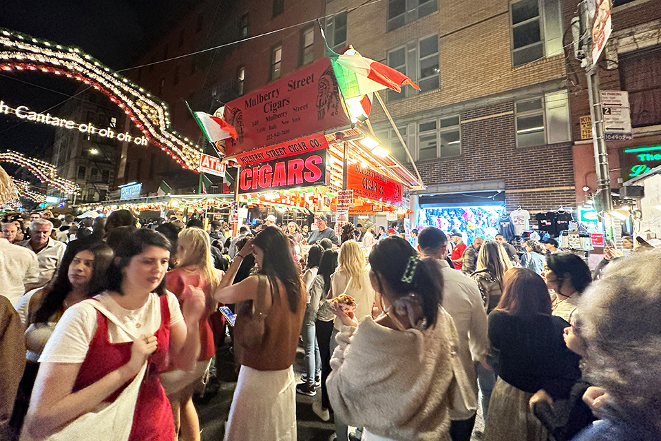 Things To Do in Little Italy with Kids :Feast of San Gennaro people walking the streets, enjoying the festival and food