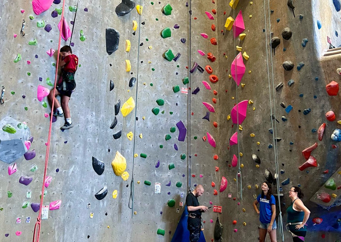 Photo of kids at an indoor rock wall - Things To Do with Teens