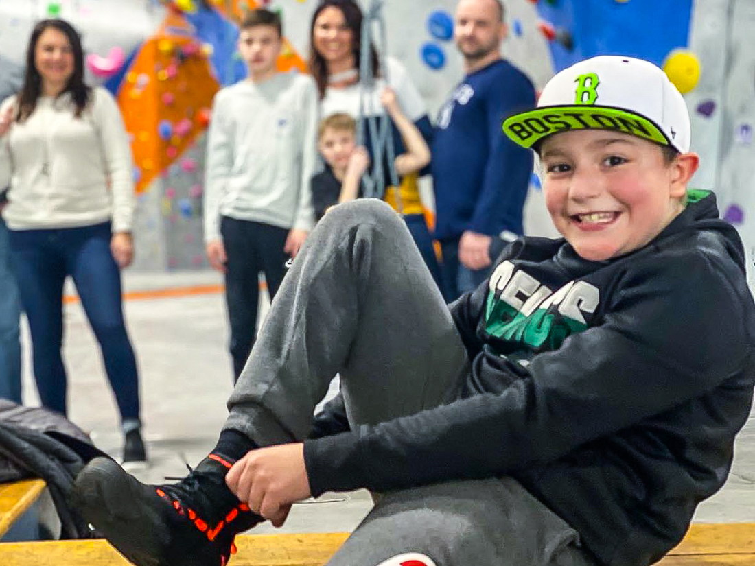 Indoor kids birthday party places in Boston make great birthday memories! Photo courtesy of Rock Spot Climbing in Dedham