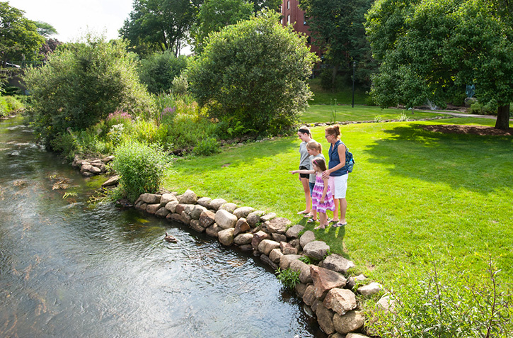 Image of family in park - Things To Do in Plymouth with Kids: Plymouth Rock and More