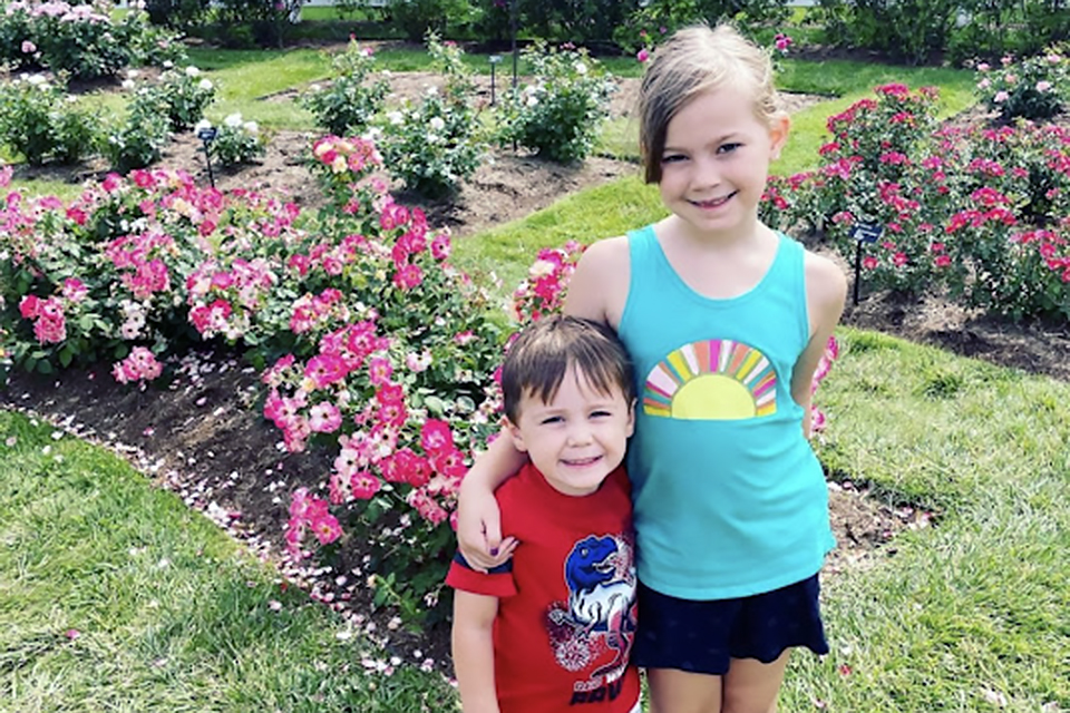 St. Louis with kids kids in flower garden