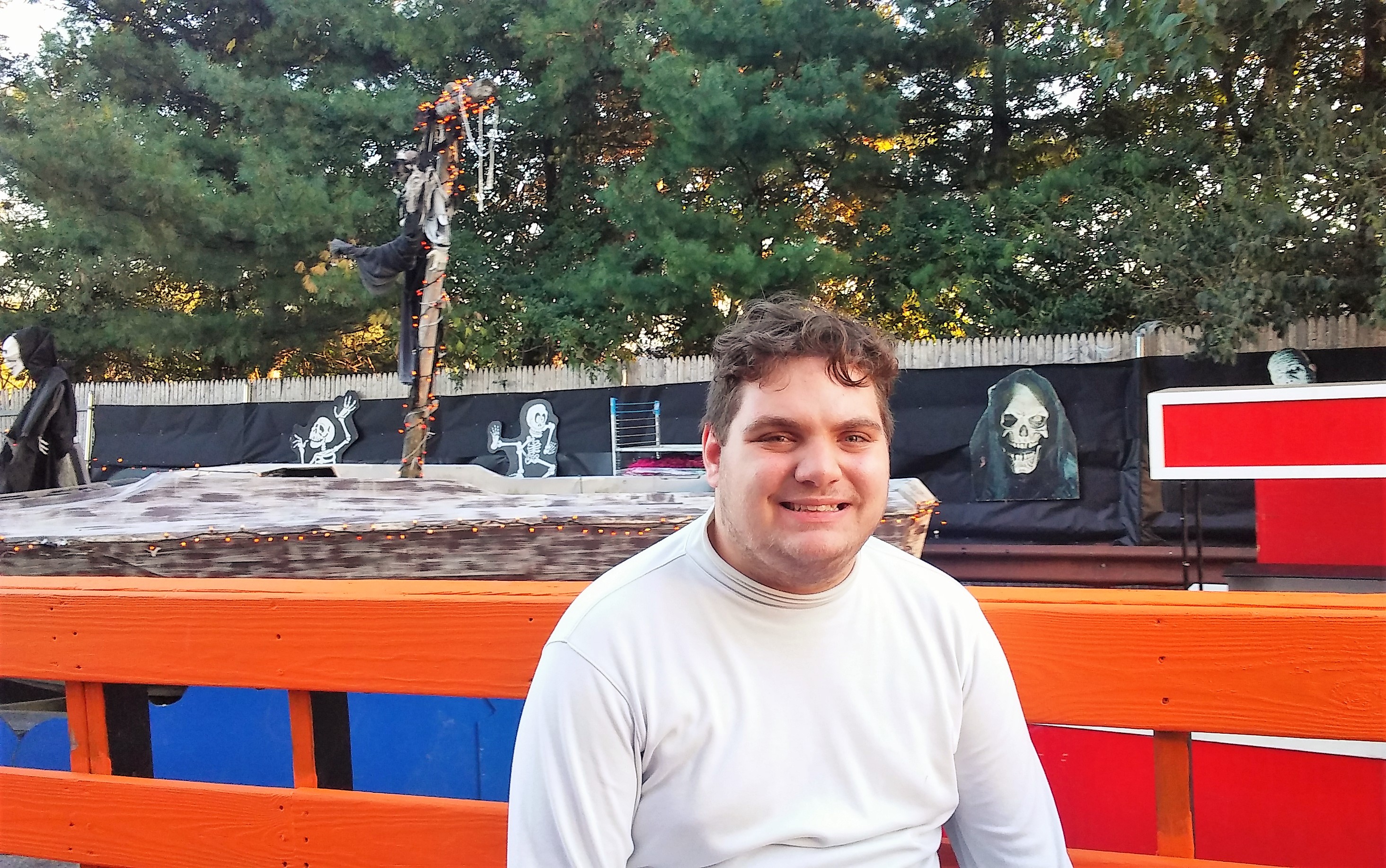 Man poses with Stew Leonard's Halloween display in Yonkers