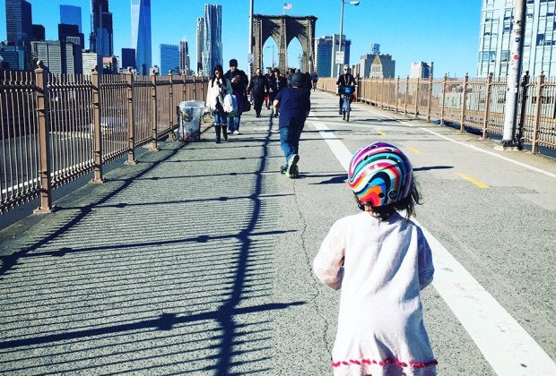 Watch the city wake up as you stroll across the Brooklyn Bridge. Photo by Meagan Newhart