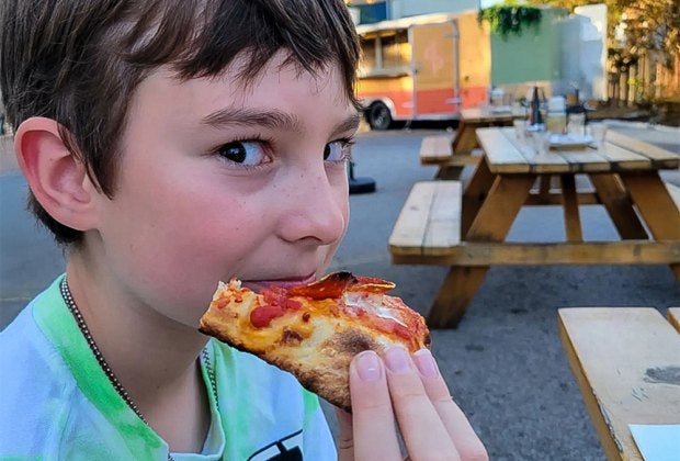 It doesn't get much better than a delicious slice of pizza! Photo courtesy of Stracci Pizza