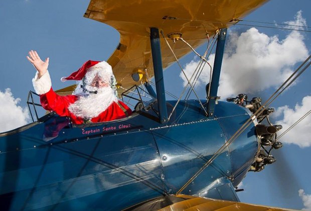 Watch Santa arrive by plane at Stearman Santa. Photo courtesy of Lone Star Flight Museum.