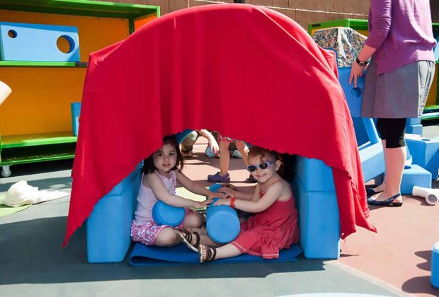 Play with sand, water, or the big blue blocks at the Imagination Playground. Photo courtesy NYC Parks