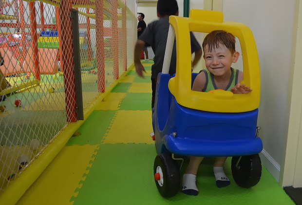 Toys and pretend-play items encourage screen-free play. 