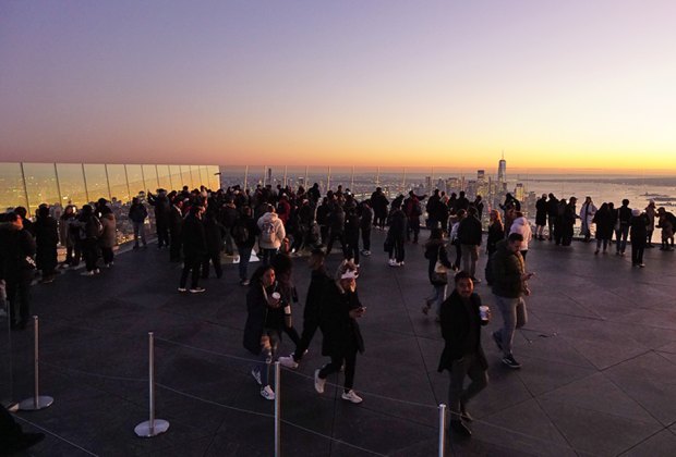 See the sunset from the suspended observation deck at the Edge for a memorable after-dark outing. Photo by Jody Mercier