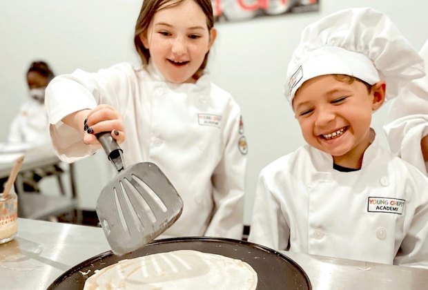 At Young Chefs Academy, kids are guided through a stage-by-stage cooking class that allows them to build on their newfound skills. Photo courtesy of Young Chefs Academy