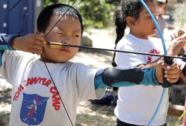 Where else are kids going to learn archery, besides summer camp?  Photo courtesy of Tom Sawyer Camp