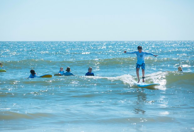 Learn to surf at Virginia Beach. Photo courtesy of Virginia Beach Convention & Visitors Bureau