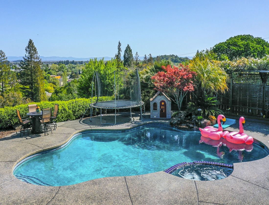Rent a gorgeous backyard pool like this for your family for an hour or a day. Photo courtesy of Swimply