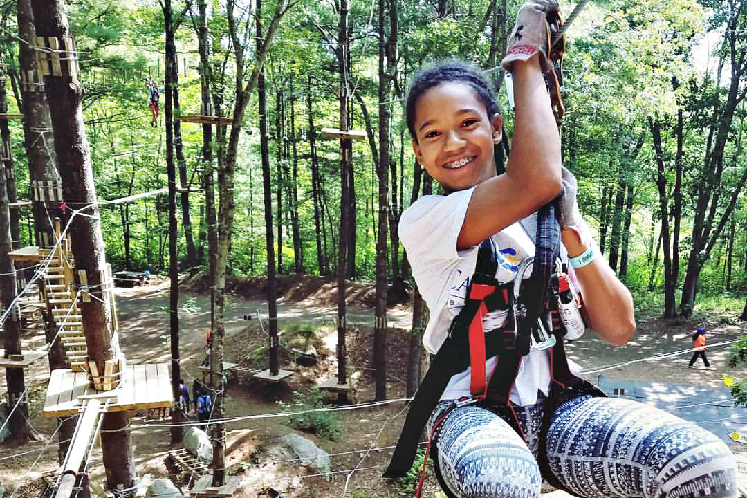 Kids will love to zip between the trees in Canton. Photo courtesy of TreeTop Adventures