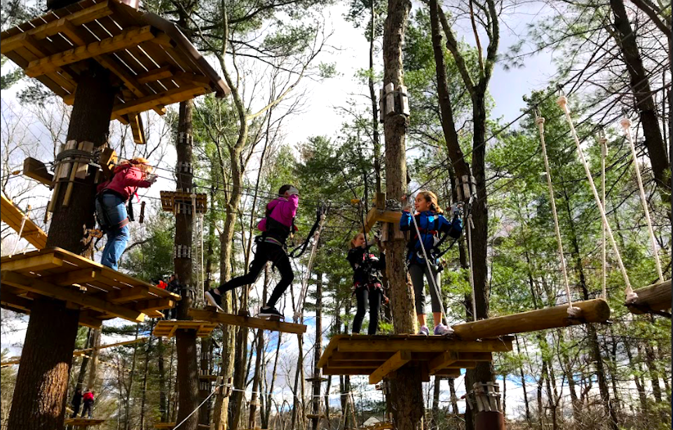 Kids ages 7 and up can navigate the ropes and zipline courses.